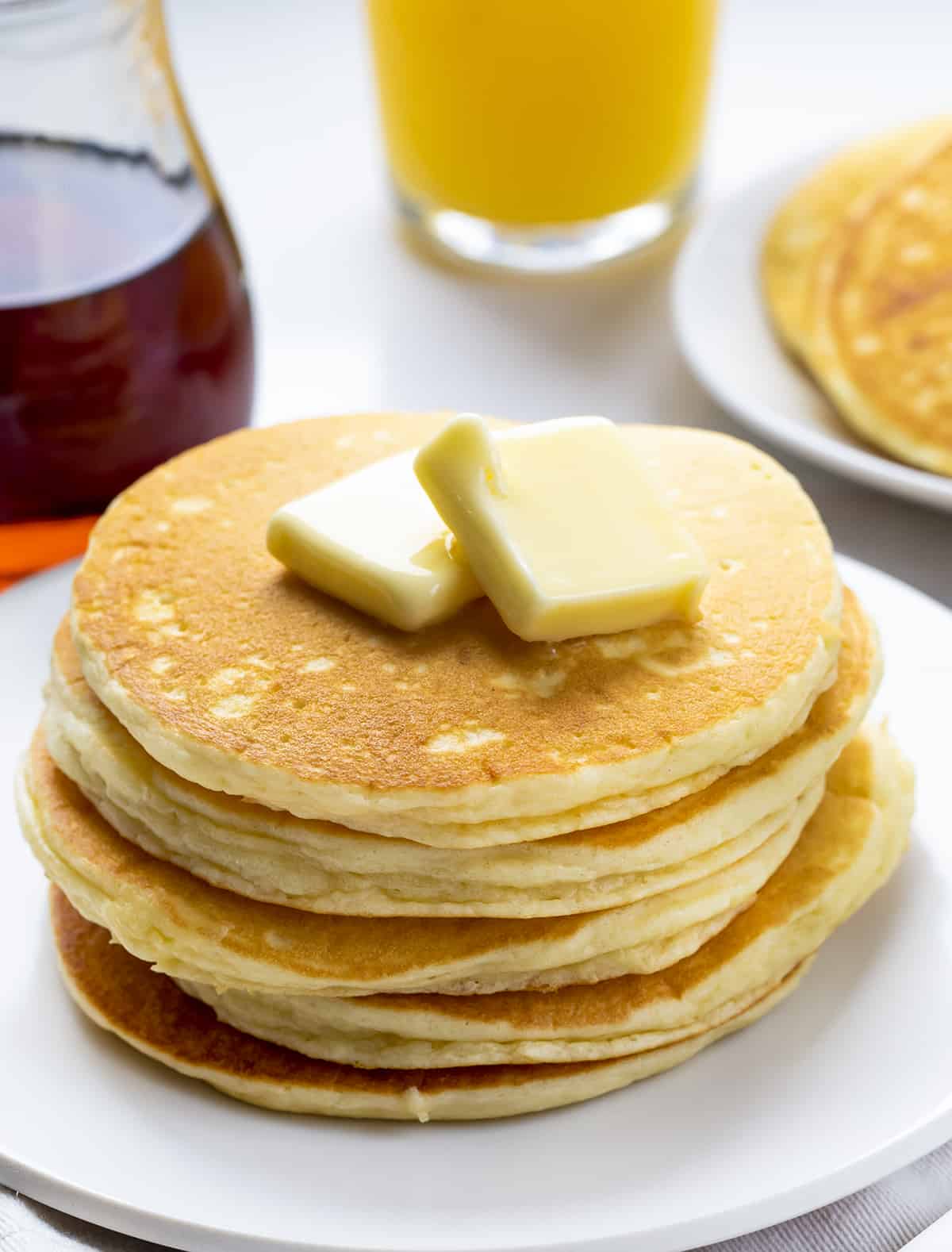 Stack of Buttermilk Pancakes with Syrup and More Pancakes in Back. Breakfast, Pancakes, Buttermilk Pancakes, Easy Pancakes, The Best Pancakes, Classic Pancakes, Breakfast Recipes, Kid Breakfast Recipes, i am baker, iambaker.