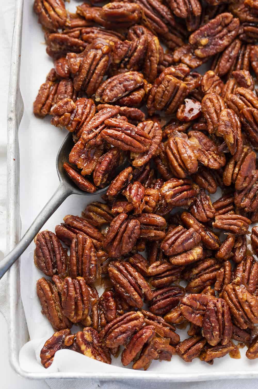 Overhead of Candied Pecans in Pan with Spoon
