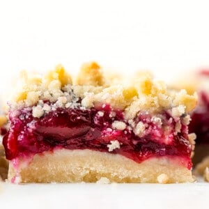 Close up of Cherry Pie Bar. Dessert, Baking, Bars, Cherry Bars, Cherry Pie Bars, Homemade Cherry Pie Filling, Easy Bars, Real Cherry Desserts, Summer Baking, Winter Baking, Christmas Recipes, i am baker, iambaker.