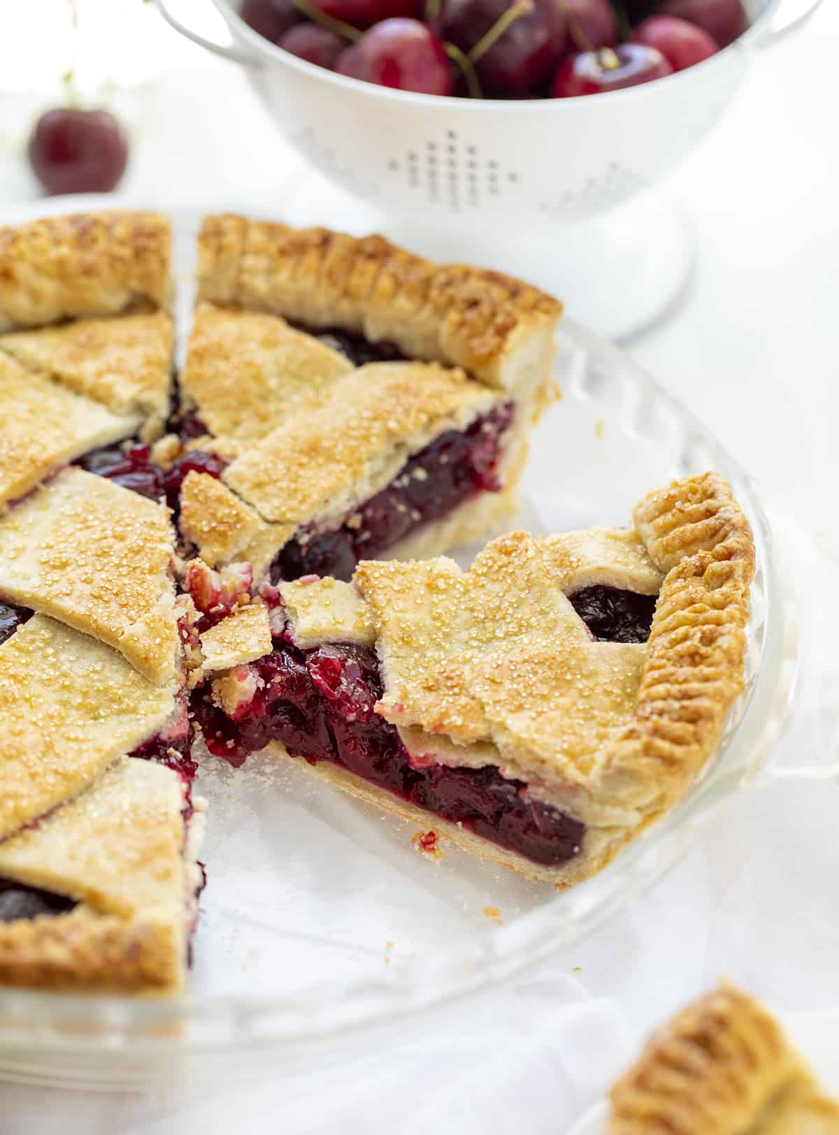 Cherry Pie in the Pie Dish with a Piece Removed. Cherry Pie, Homemade Pie, Real Homemade Cherry Pie, How to Make Cherry Pie Filling, Best Homemade Pie Crust, Old Fashioned Cherry Pie, The Best Cherry Pie, Baking, Dessert, Christmas Pie, Thanksgiving Pie, Easy Cherry Pie, i am baker, iambaker