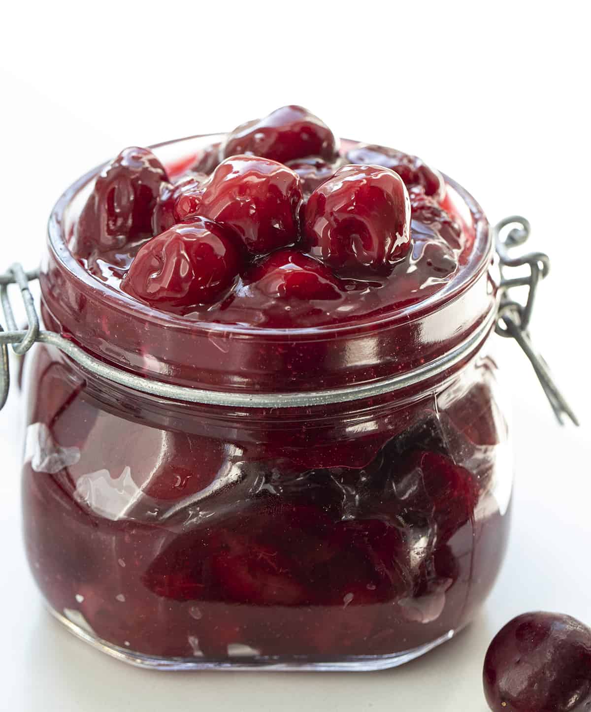 Jar of Cherry Pie Filling on White Counter. Cherry Pie Filling, Sweet Cherries, How to Pit Cherries, Cherry Desserts, Dessert, Pie Filling. Homemade Cherry Pie Filling, From Scratch Cherry Pie Filling, Cherry Pie, i am baker, iambaker