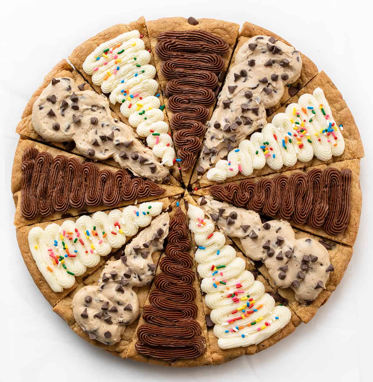 Cookie Cake for a Crowd with Chocolate Frosting, Vanilla Frosting, and Cookie Dough Frosting. 