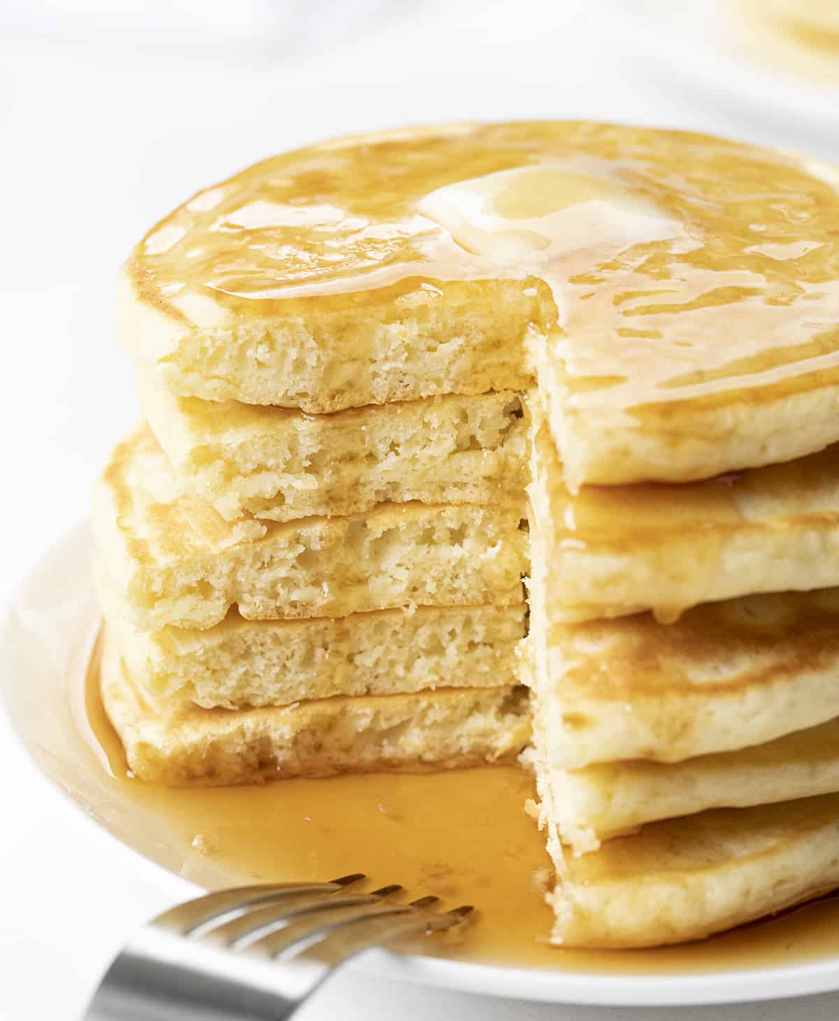 Stack of Grandma's Old Fashioned Pancakes with Pice Cut Out. Breakfast, Pancakes, Old Fahsioned Pancakes, Classic Pancake Recipe, Grandma's Pancake Recipe, i am baker, iambaker.