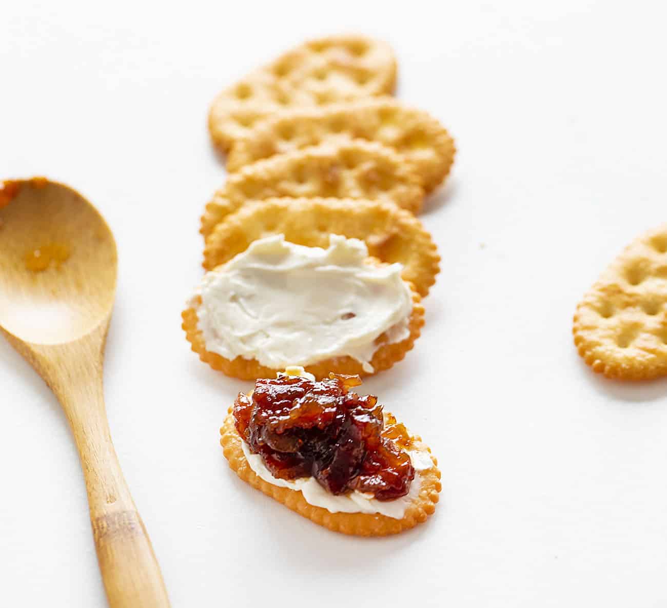 Onion Bacon Jam on a Cracker with Cream Cheese