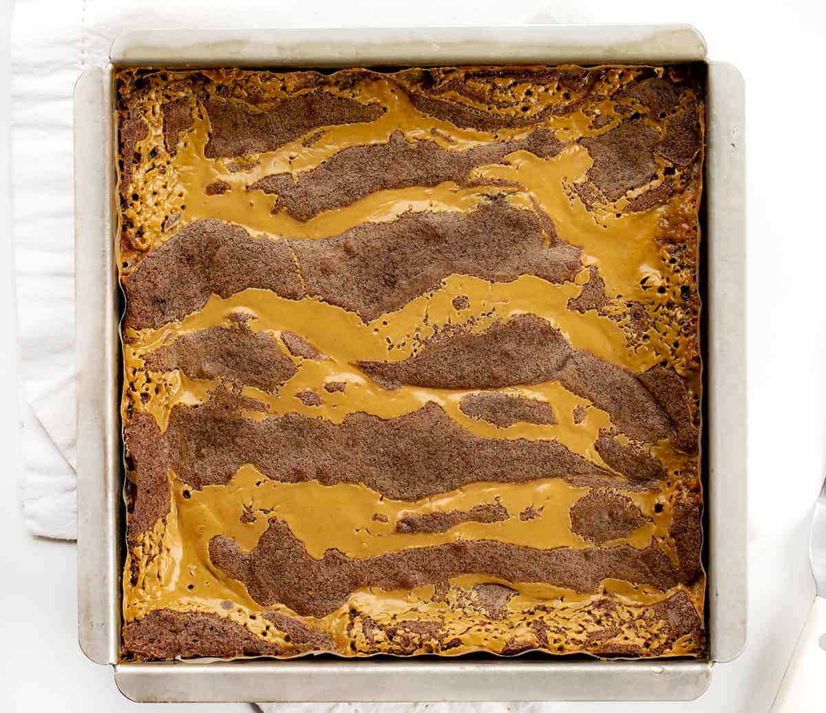 Overhead Image of Peanut Butter Brownie Carmelitas in a Baking Dish