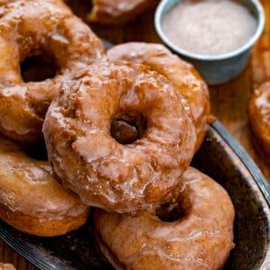 Try of Glazed Pumpkin Donuts on Cutting Board. Breakfast, Donuts, Donut Recipes, Pumpkin Donut Recipes, How to Fry Donuts, Pumpkin Donuts in the Air Fryer, How to Bake Donuts, Baked Pumpkin Donuts, Brunch Ideas, Fall Baking, Best Pumpkin Donuts, i am baker, iambaker