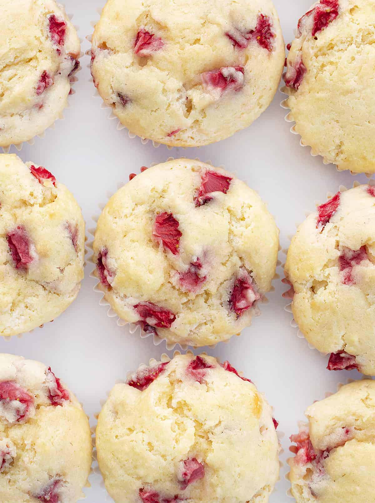 Overhead of Real Strawberry Muffins Together on Counter