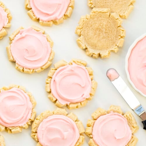 Frosted Sugar Cookies from Overhead with a Few Cookies not Frosted. Dessert, Cookies, Cookie Recipes, Swig Copycat, Baking, Cookie Exchange, Frosted Cookies, iambaker cookie recipes, the best sugar cookies, sugar cookie, i am baker, iambaker