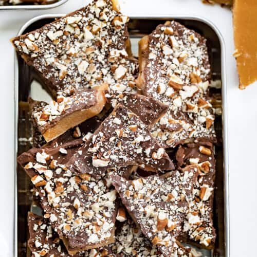 Trays of Homemade English Toffee broken into Pieces. Candy, Candy Making, Toffee, English Toffee, How to Make Toffee, The Best Toffee, Cookie Exchange, Christmas Dessert, Dessert, Thanksgiving Dessert, Gift Exchange Dessert, i am baker, iambaker