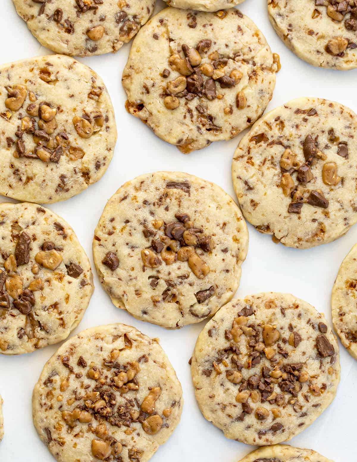 Overhead of Toffee Icebox Cookies. Cookies, Baking, Icebox Cookies, Toffee Cookies, Chocolate Toffee Cookies, Cookie Recipes, Can You Freeze Cookies, Shortbread Cookies, Dessert, i am baker, iambaker