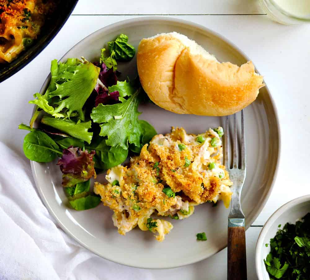 Tuna Casserole on a Plate with Salad and Bread