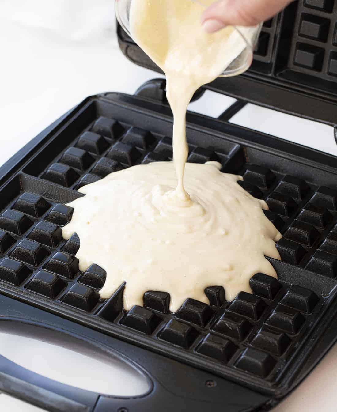 Pouring Waffle Batter on Waffle Iron